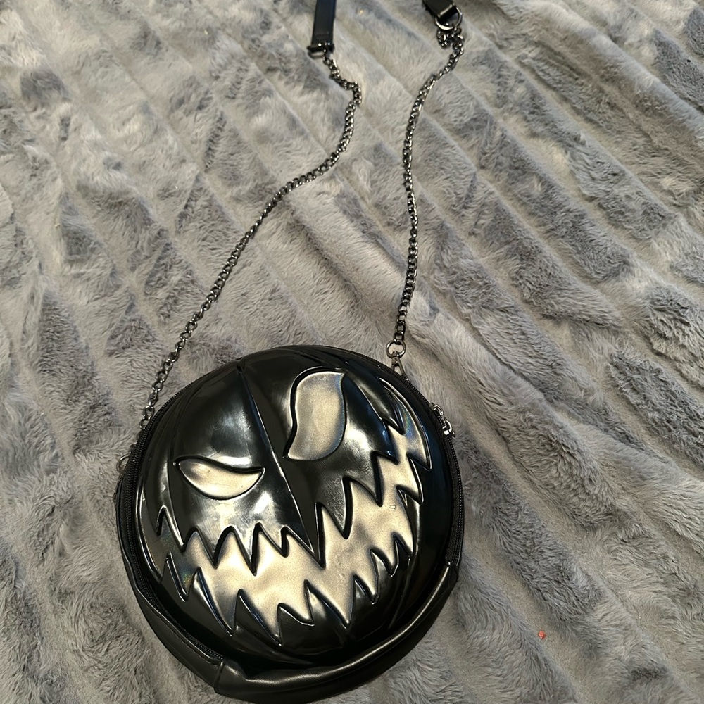 Spirit Black Round Crossbody Bag with Silver Accent Face
